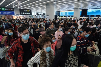 Many people wearing masks as protection against the COVID-19 coronavirus