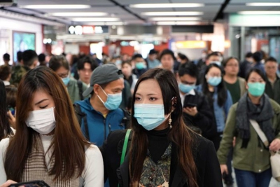 Many people wearing masks as protection against the COVID-19 coronavirus