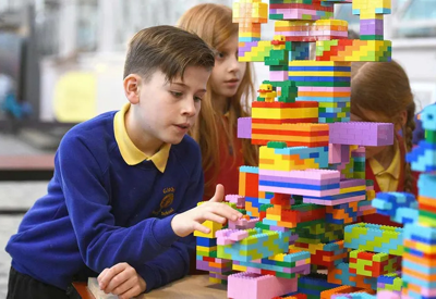 Children playing Lego